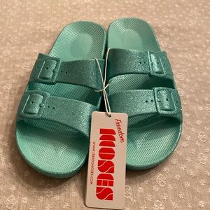 Freedom Moses turquoise sparkle slides